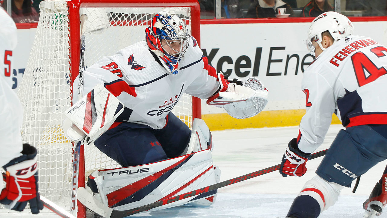 SAINT PAUL, MN - JANUARY 8: Zach Fucale #60 and Martin Fehervary #42 of the Wasington Capitals defend their goal against the Minnesota Wild during the game at the Xcel Energy Center on January 8, 2022 in Saint Paul, Minnesota.