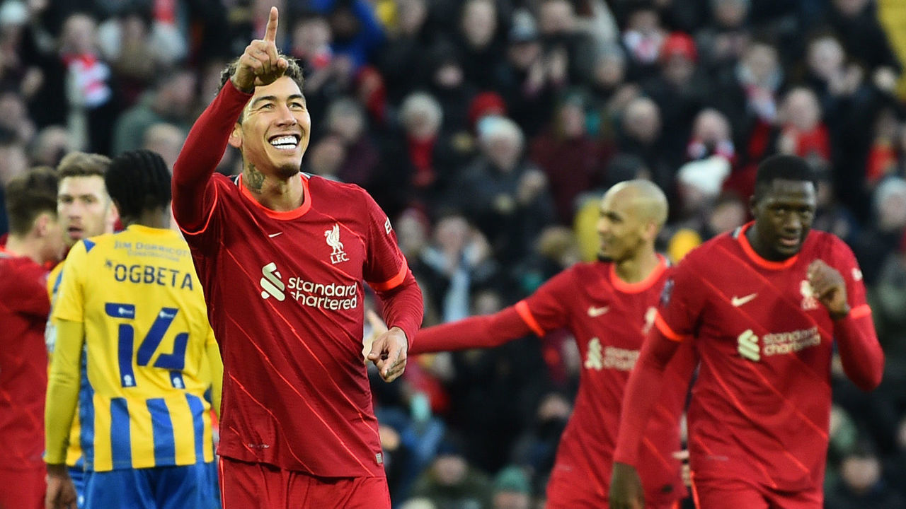 LIVERPOOL, ENGLAND - JANUARY 09: (THE SUN OUT,THE SUN ON SUNDAY OUT) Roberto Firmino of Liverpool celebrates after scoring the third goal during the Emirates FA Cup Third Round match between Liverpool and Shrewsbury Town at Anfield on January 09, 2022 in Liverpool, England.