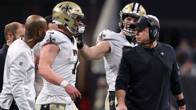 ATLANTA, GEORGIA - JANUARY 09: Head coach Sean Payton of the New Orleans Saints talks with Taysom Hill #7 of the New Orleans Saints on the field during the second quarter in the game against the Atlanta Falcons at Mercedes-Benz Stadium on January 09, 2022 in Atlanta, Georgia.