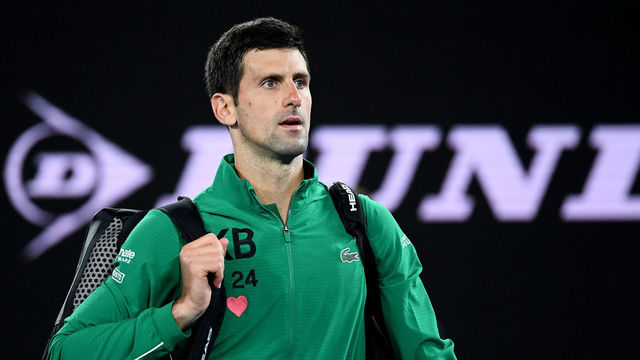 MELBOURNE, AUSTRALIA - JANUARY 28: Novak Djokovic of Serbia walks off after winning his Men’s Singles Quarterfinal match against Milos Raonic of Canada on day nine of the 2020 Australian Open at Melbourne Park on January 28, 2020 in Melbourne, Australia.