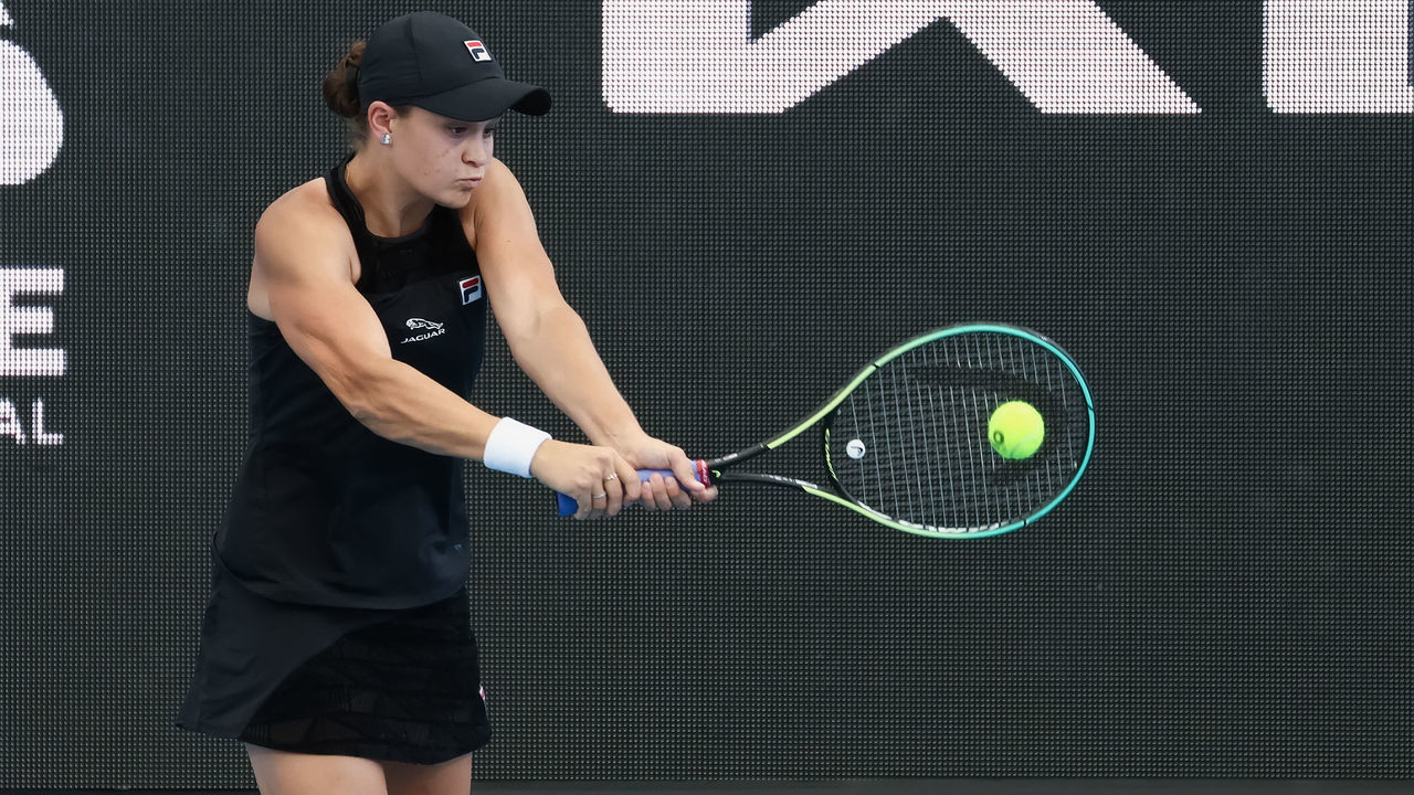 ADELAIDE, AUSTRALIA - JANUARY 09: Ash Barty of Australia hits a backhand during the WTA finals singles match between Ash Barty of Australia and Elena Rybakina of Kazakhstan on day seven of the Adelaide International tennis tournament at Memorial Drive on January 09, 2022 in Adelaide, Australia.