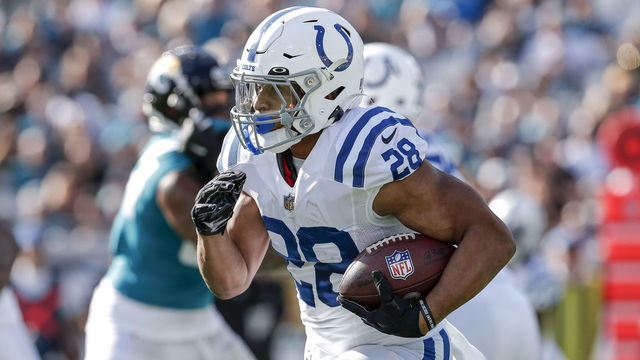 JACKSONVILLE, FL - JANUARY 9: Running back Jonathan Taylor #28 of the Indianapolis Colts rushes against the Jacksonville Jaguars at TIAA Bank Field on January 9, 2022 in Jacksonville, Florida. The Jaguars won 26 -11.