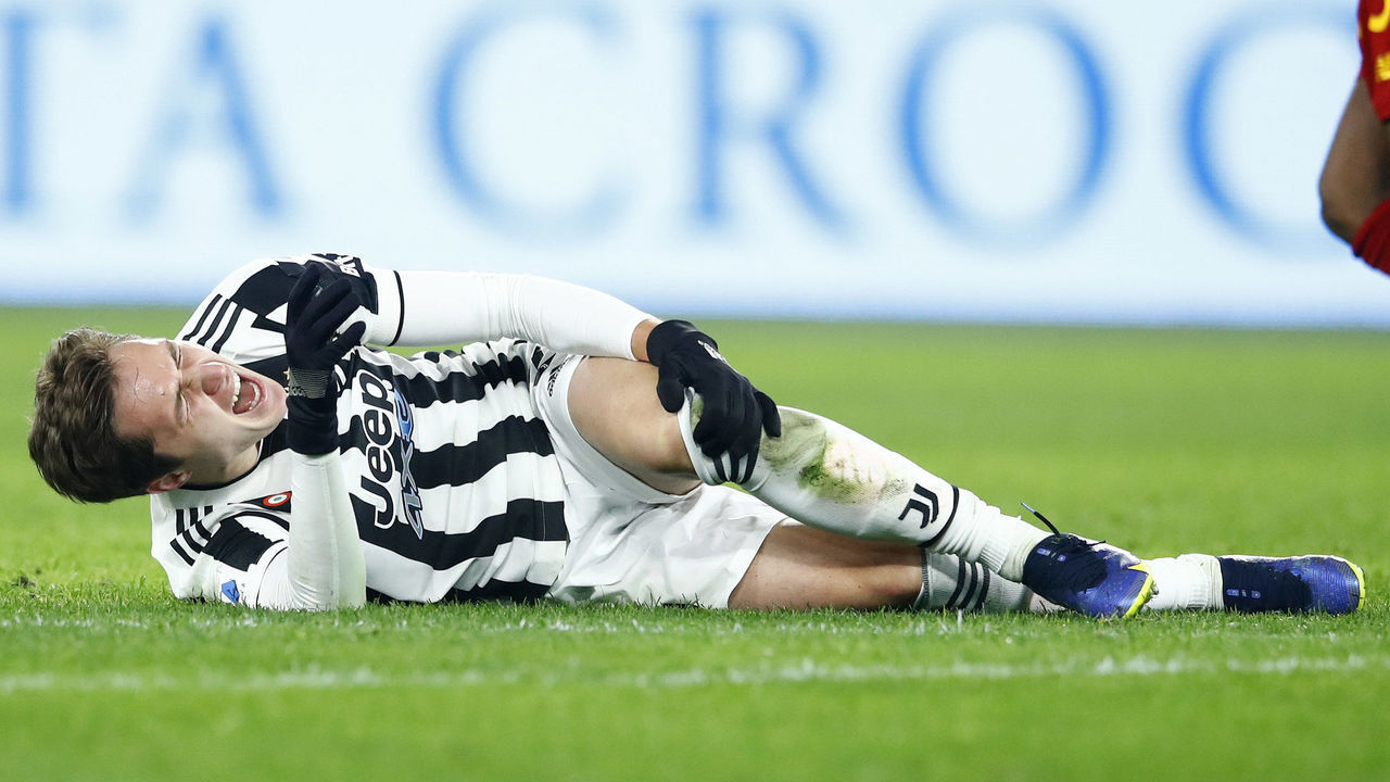 ROME, ITALY - JANUARY 09: Federico Chiesa of Juventus injured during the Serie A match between AS Roma and Juventus at Stadio Olimpico on January 9, 2022 in Rome, Italy.