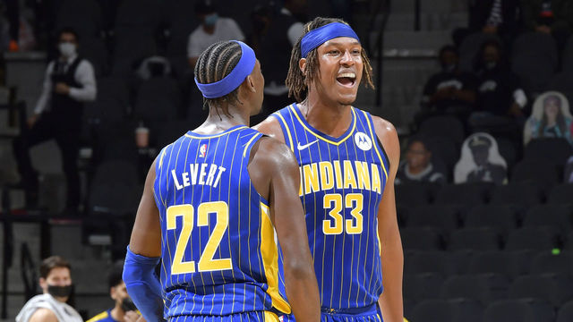 SAN ANTONIO, TX - APRIL 3: Myles Turner #33 hi-fives Caris LeVert #22 of the Indiana Pacers during the game against the San Antonio Spurs on April 3, 2021 at the AT&T Center in San Antonio, Texas. Mandatory Copyright Notice: Copyright 2021 NBAE (Photos by Logan Riely/NBAE via Getty Images)