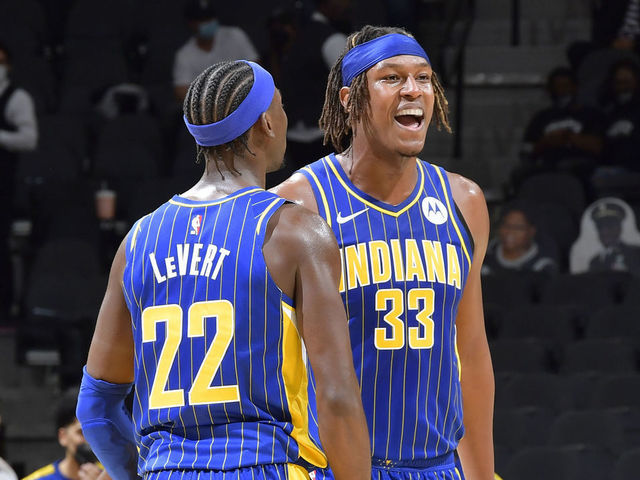 SAN ANTONIO, TX - APRIL 3: Myles Turner #33 hi-fives Caris LeVert #22 of the Indiana Pacers during the game against the San Antonio Spurs on April 3, 2021 at the AT&T Center in San Antonio, Texas. Mandatory Copyright Notice: Copyright 2021 NBAE (Photos by Logan Riely/NBAE via Getty Images)