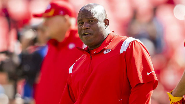 KANSAS CITY, MO - SEPTEMBER 26: Chiefs Offensive Coordinator Eric Bieniemy watches player warmups prior to the game between the Kansas City Chiefs and the Los Angeles Chargers on September 26, 2021 at Arrowhead Stadium in Kansas City, MO.