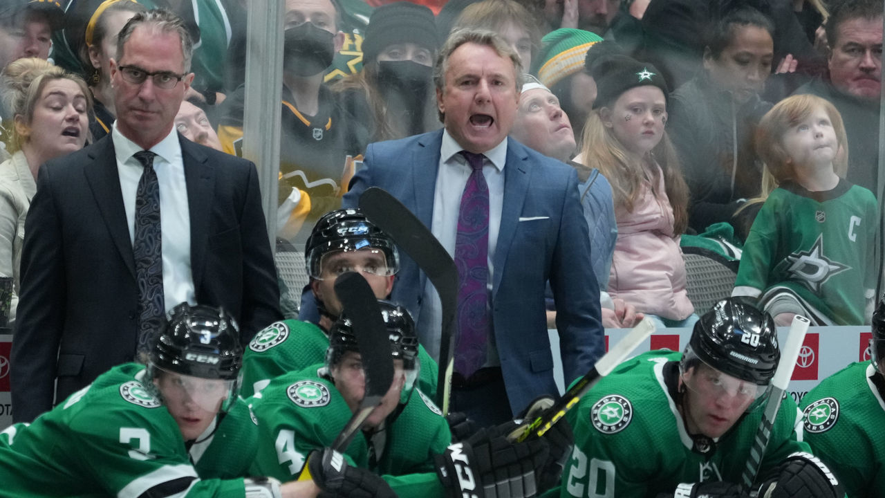DALLAS, TX - JANUARY 8: Rick Bowness of the Dallas Stars behind the bench against the Pittsburgh Penguins at the American Airlines Center on January 8, 2022 in Dallas, Texas.