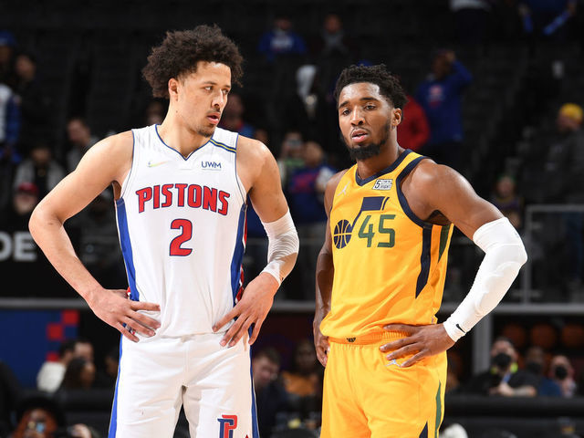DETROIT, MI - JANUARY 10: Cade Cunningham #2 of the Detroit Pistons and Donovan Mitchell #45 of the Utah Jazz look on during the game on January 10, 2022 at Little Caesars Arena in Detroit, Michigan. NOTE TO USER: User expressly acknowledges and agrees that, by downloading and/or using this photograph, User is consenting to the terms and conditions of the Getty Images License Agreement. Mandatory Copyright Notice: Copyright 2022 NBAE