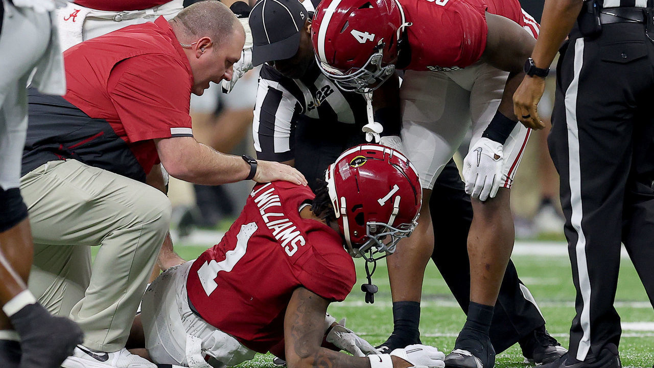 INDIANAPOLIS, INDIANA - JANUARY 10: Jameson Williams #1 of the Alabama Crimson Tide down on the field with an injury during the second quarter of the game against the Georgia Bulldogs during the 2022 CFP National Championship Game at Lucas Oil Stadium on January 10, 2022 in Indianapolis, Indiana.
