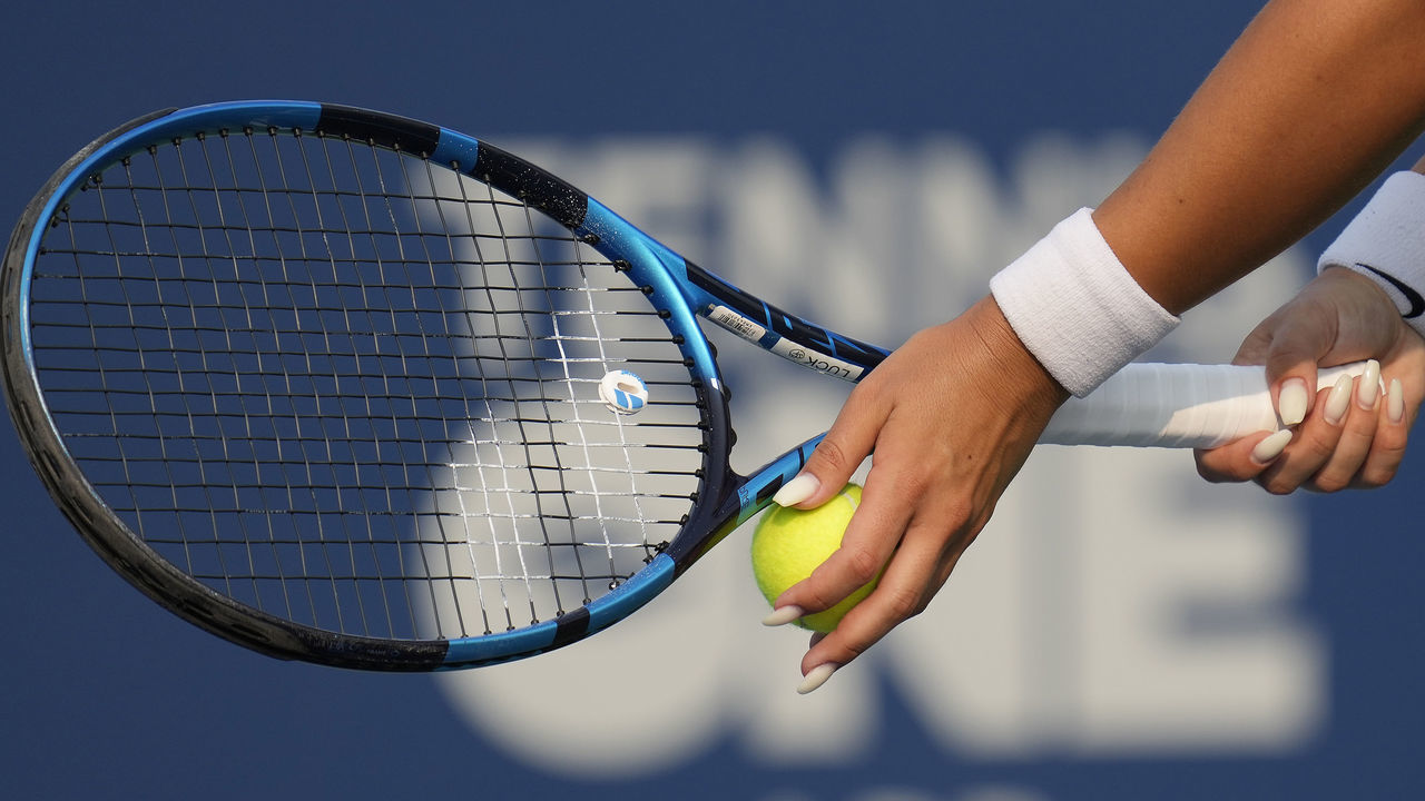 SAN JOSE, CALIFORNIA - AUGUST 06: A detailed view of Ana Konjuh of Croatia using a Babolat tennis racket serving a Wilson tennis ball to Shuai Zhang of China during their quarterfinal match on Day 5 of the Mubadala Silicon Valley Classic at Spartan Tennis Complex on August 06, 2021 in San Jose, California.