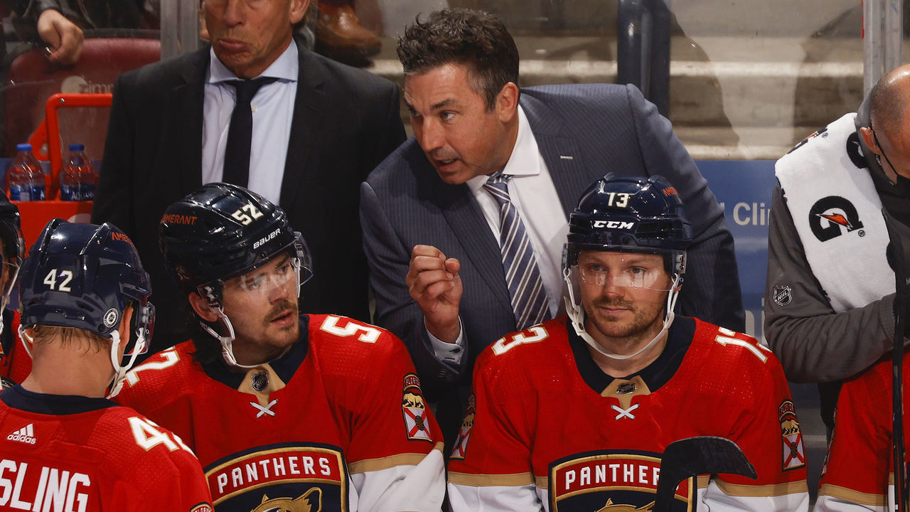 SUNRISE, FL - DECEMBER 30: Florida Panthers Interim head coach Andrew Brunette talks to MacKenzie Weegar #52 of the Florida Panthers during a break in action against the Tampa Bay Lightning at the FLA Live Arena on December 30, 2021 in Sunrise, Florida.