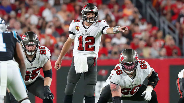 TAMPA, FL - JANUARY 9: Tampa Bay Buccaneers Quarterback Tom Brady (12) points out the defense during the regular season game between the Carolina Panthers and the Tampa Bay Buccaneers on January 9, 2022 at Raymond James Stadium in Tampa, Florida.