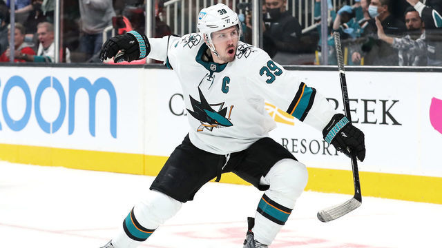 SAN JOSE, CA - JANUARY 11: Logan Couture #39 of the San Jose Sharks celebrates scoring the game-winning goal in overtime against the Detroit Red Wings at SAP Center on January 11, 2022 in San Jose, California.