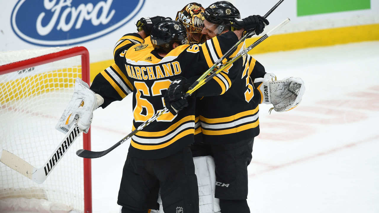 BOSTON, MA - MARCH 7: Brad Marchand #63, Tuukka Rask #40, Patrice Bergeron #37 of the Boston Bruins celebrate the win against the Florida Panthers at the TD Garden on March 7, 2019 in Boston, Massachusetts.