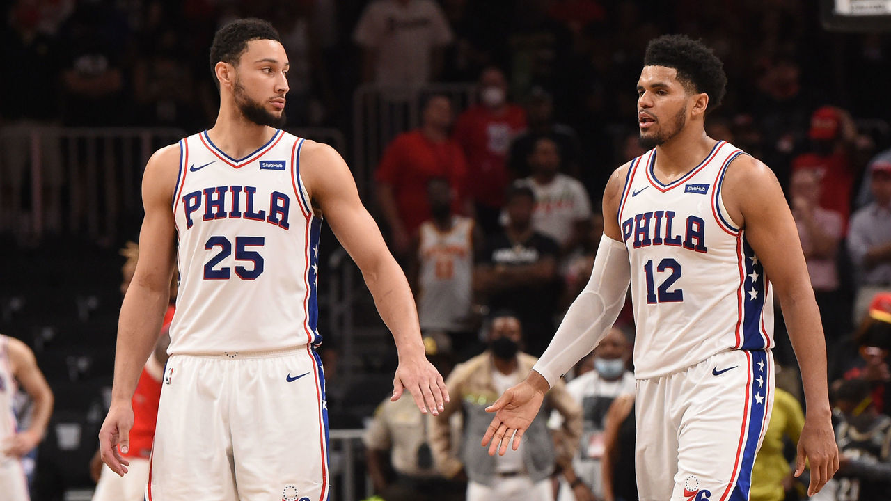 ATLANTA, GA - JUNE 18: Ben Simmons #25 of the Philadelphia 76ers and Tobias Harris #12 of the Philadelphia 76ers high-five during a game against the Atlanta Hawks during Round 2, Game 6 of the Eastern Conference Playoffs on June 18, 2021 at State Farm Arena in Atlanta, Georgia. NOTE TO USER: User expressly acknowledges and agrees that, by downloading and/or using this Photograph, user is consenting to the terms and conditions of the Getty Images License Agreement. Mandatory Copyright Notice: Copyright 2021 NBAE
