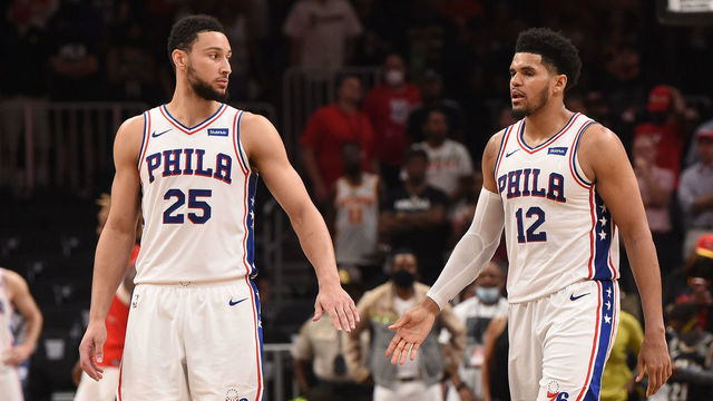 ATLANTA, GA - JUNE 18: Ben Simmons #25 of the Philadelphia 76ers and Tobias Harris #12 of the Philadelphia 76ers high-five during a game against the Atlanta Hawks during Round 2, Game 6 of the Eastern Conference Playoffs on June 18, 2021 at State Farm Arena in Atlanta, Georgia. NOTE TO USER: User expressly acknowledges and agrees that, by downloading and/or using this Photograph, user is consenting to the terms and conditions of the Getty Images License Agreement. Mandatory Copyright Notice: Copyright 2021 NBAE