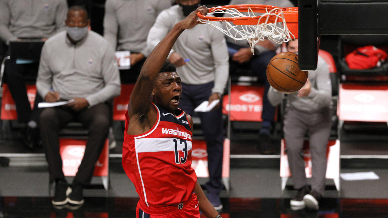 NEW YORK, NEW YORK - JANUARY 03: Thomas Bryant #13 of the Washington Wizards dunks during the first half against the Brooklyn Nets at Barclays Center on January 03, 2021 in the Brooklyn borough of New York City. NOTE TO USER: User expressly acknowledges and agrees that, by downloading and/or using this Photograph, user is consenting to the terms and conditions of the Getty Images License Agreement.
