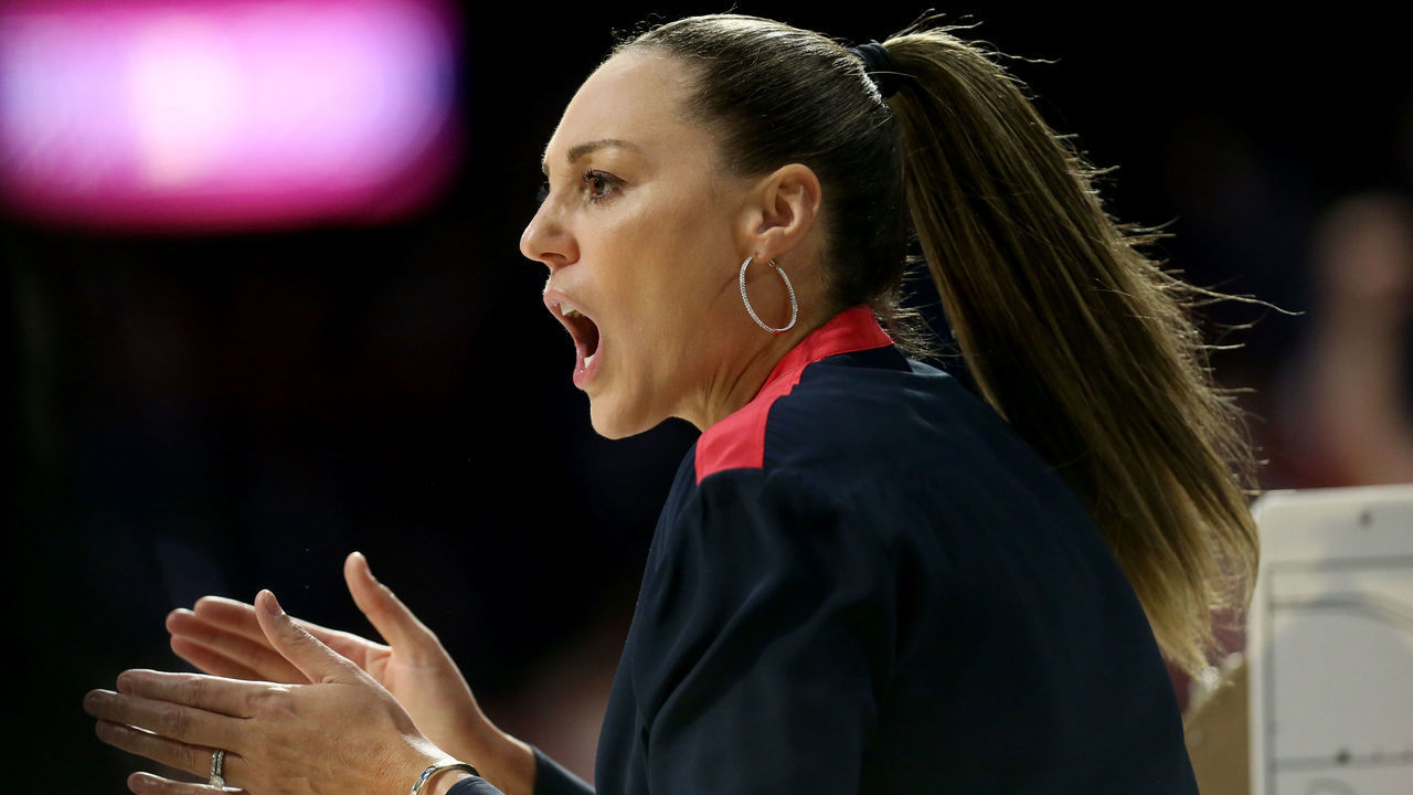 TUCSON, AZ - JANUARY 07: University of Arizona Wildcats head basketball coach Adia Barnes while coaching her team to her 100th win as a head coach on January 07, 2022 at McKale Center in Tucson, AZ.