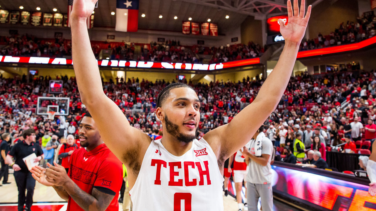 LUBBOCK, TEXAS - JANUARY 08: Forward Kevin Obanor #0 of the Texas Tech Red Raiders signals after the college basketball game against the Kansas Jayhawks at United Supermarkets Arena on January 08, 2022 in Lubbock, Texas.