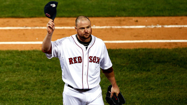BOSTON, MA - OCTOBER 23: Jon Lester #31 of the Boston Red Sox tips his cap as he leaves the game in the eighth inning against the St. Louis Cardinals during Game One of the 2013 World Series at Fenway Park on October 23, 2013 in Boston, Massachusetts.