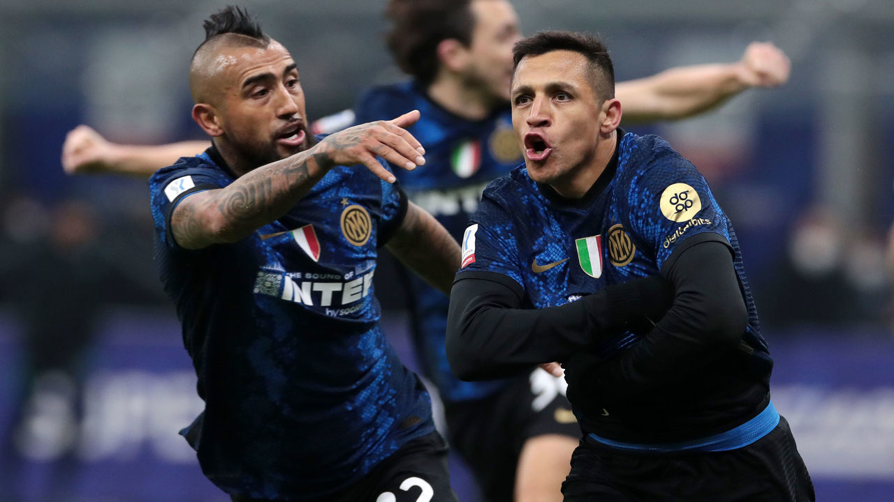 MILAN, ITALY - JANUARY 12: Alexis Sanchez of FC Internazionale celebrates after scoring their team's second goal during the italian SuperCup match between FC Internazionale and Juventus at Stadio Giuseppe Meazza on January 12, 2022 in Milan, Italy.