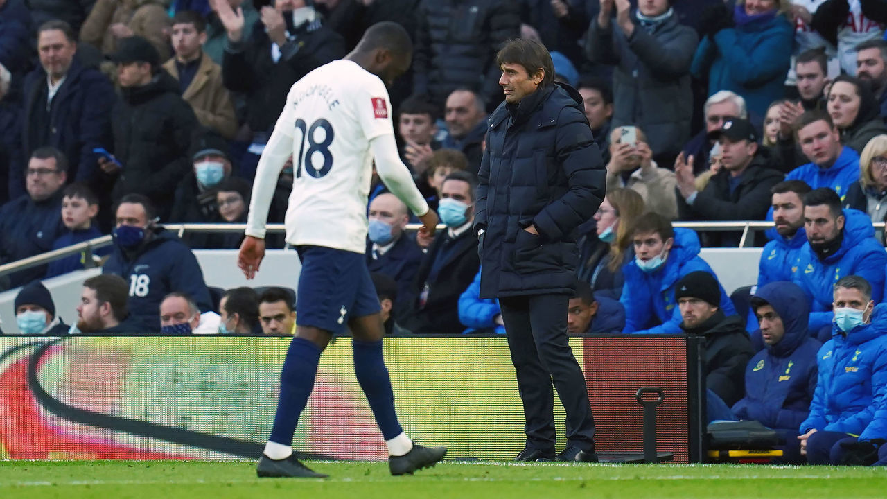 Tottenham Hotspur manager Antonio Conte (right) looks on as Tottenham Hotspur's Tanguy Ndombele is substituted off during the Emirates FA Cup third round match at Tottenham Hotspur Stadium, London. Picture date: Sunday January 9, 2022.