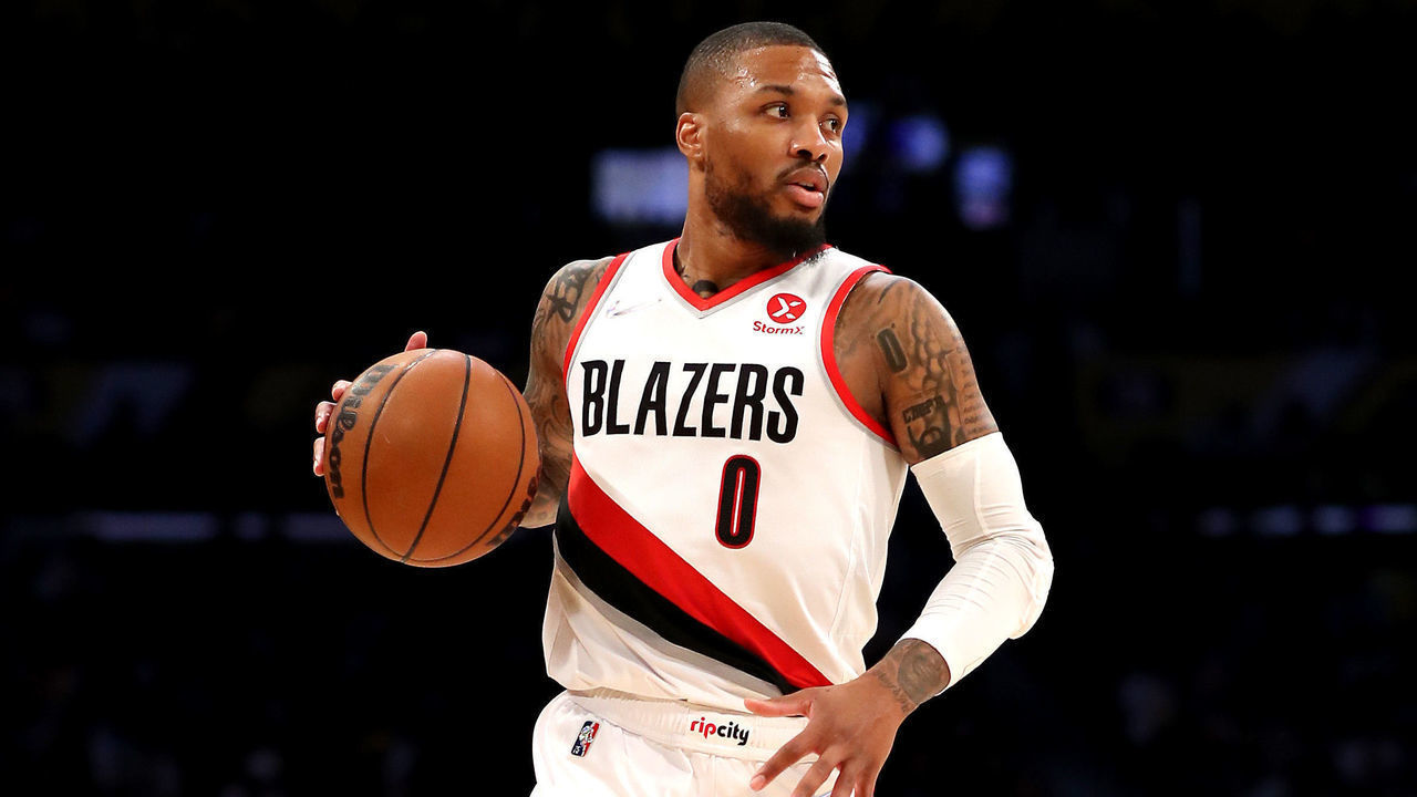 LOS ANGELES, CALIFORNIA - DECEMBER 31: Damian Lillard #0 of the Portland Trail Blazers handles the ball during the first quarter against the Los Angeles Lakers at Crypto.com Arena on December 31, 2021 in Los Angeles, California.
