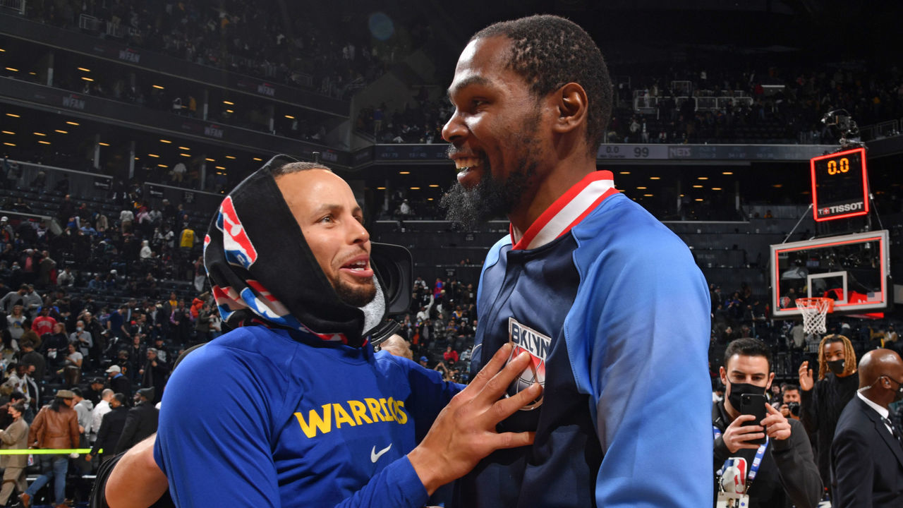 BROOKLYN, NY - NOVEMBER 16: Stephen Curry #30 of the Golden State Warriors and Kevin Durant #7 of the Brooklyn Nets talk after a game on November 16, 2021 at Barclays Center in Brooklyn, New York. NOTE TO USER: User expressly acknowledges and agrees that, by downloading and/or using this Photograph, user is consenting to the terms and conditions of the Getty Images License Agreement. Mandatory Copyright Notice: Copyright 2021 NBAE