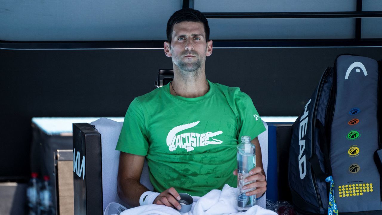 TOPSHOT - Novak Djokovic of Serbia takes part in a practice session ahead of the Australian Open tennis tournament in Melbourne on January 13, 2022. - -- IMAGE RESTRICTED TO EDITORIAL USE - STRICTLY NO COMMERCIAL USE --