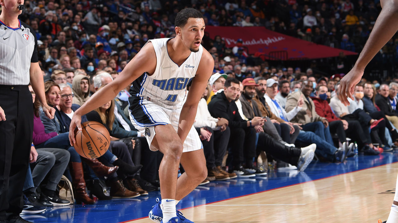 PHILADELPHIA, PA - NOVEMBER 29: Jalen Suggs #4 of the Orlando Magic handles the ball against the Philadelphia 76ers on November 29, 2021 at Wells Fargo Center in Philadelphia, Pennsylvania. NOTE TO USER: User expressly acknowledges and agrees that, by downloading and/or using this Photograph, user is consenting to the terms and conditions of the Getty Images License Agreement. Mandatory Copyright Notice: Copyright 2021 NBAE