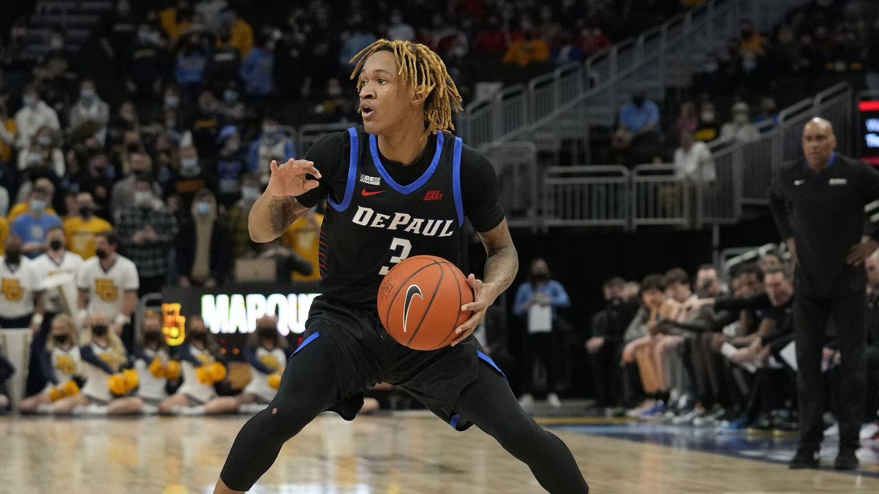 MILWAUKEE, WISCONSIN - JANUARY 11: Jalen Terry #3 of the DePaul Blue Demons dribbles the ball against the Marquette Golden Eagles in the first half at Fiserv Forum on January 11, 2022 in Milwaukee, Wisconsin.