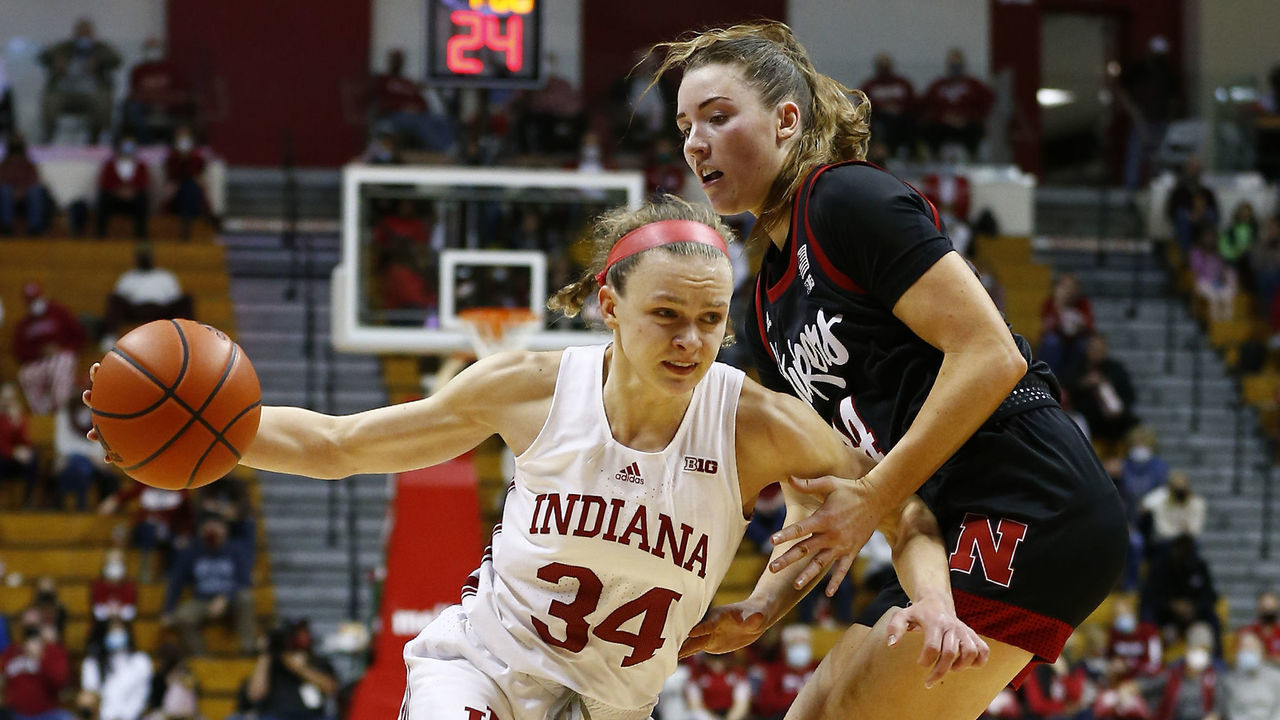 BLOOMINGTON, IN - JANUARY 13: Indiana Hoosiers guard Grace Berger (34) drives past Nebraska Cornhuskers forward Isabelle Bourne (34) during a womens college basketball game between the Nebraska Cornhuskers and the Indiana Hoosiers on January 13, 2022, at Assembly Hall, in Bloomington, IN.