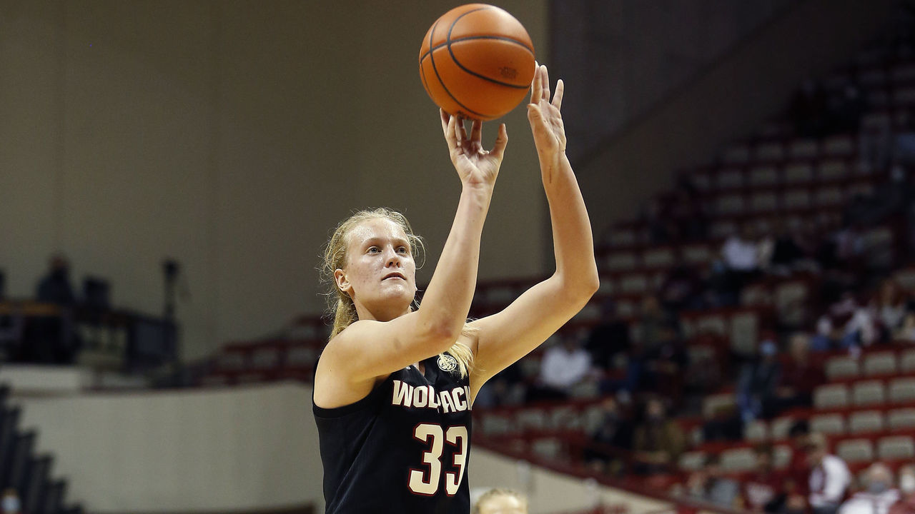 BLOOMINGTON, IN - DECEMBER 02: NC State Wolfpack center Elissa Cunane (33) goes up with her shot during a womens college basketball game between the NC State Wolfpack and Indiana Hoosiers on December 02, 2021 at Assembly Hall in Bloomington, IN.