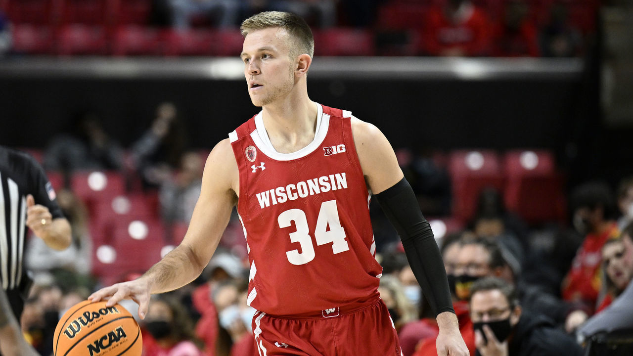 COLLEGE PARK, MARYLAND - JANUARY 09: Brad Davison #34 of the Wisconsin Badgers handles the ball against the Maryland Terrapins at Xfinity Center on January 09, 2022 in College Park, Maryland.