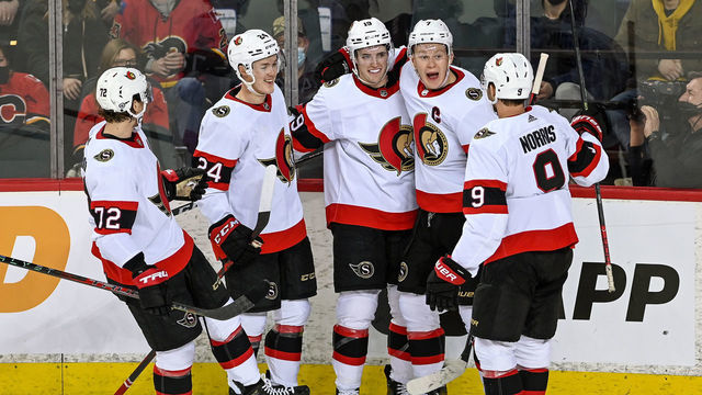 CALGARY, AB - JANUARY 13: Ottawa Senators Right Wing Drake Batherson (19) celebrates after scoring a goal with Ottawa Senators Left Wing Brady Tkachuk (7), Ottawa Senators Defenceman Jacob Bernard-Docker (24), Ottawa Senators Defenceman Thomas Chabot (72) and Ottawa Senators Center Josh Norris (9) during the second period of an NHL game where the Calgary Flames hosted the Ottawa Senators on January 13, 2022, at the Scotiabank Saddledome in Calgary, AB.