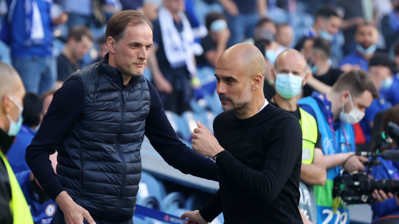 PORTO, PORTUGAL - MAY 29: Thomas Tuchel, Manager of Chelsea and Pep Guardiola, Manager of Manchester City speak prior to the UEFA Champions League Final between Manchester City and Chelsea FC at Estadio do Dragao on May 29, 2021 in Porto, Portugal.