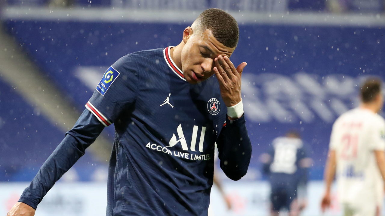 LYON, FRANCE - JANUARY 09: Kylian Mbappe of Paris Saint-Germain reacts during the Ligue 1 Uber Eats match between Olympique Lyonnais and Paris Saint Germain at Groupama Stadium on January 09, 2022 in Lyon, France.