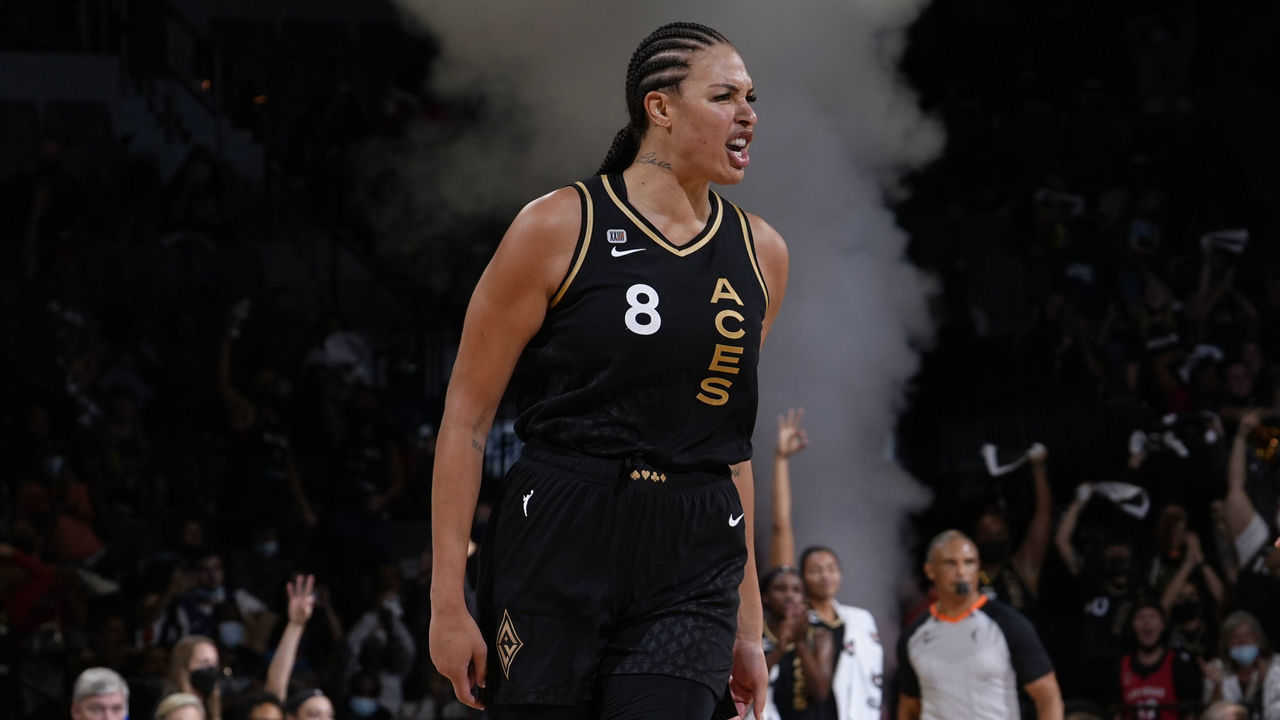 PHOENIX, AZ - OCTOBER 8: Liz Cambage #8 of the Las Vegas Aces celebrates during the game against the Phoenix Mercury during Game Five of the 2021 WNBA Semifinals on October 8, 2021 at Footprint Center in Phoenix, Arizona. Mandatory Copyright Notice: Copyright 2021 NBAE