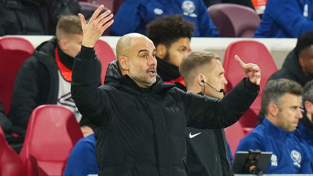 BRENTFORD, ENGLAND - DECEMBER 29: Pep Guardiola, Manager of Manchester City gives instructions to their side during the Premier League match between Brentford and Manchester City at Brentford Community Stadium on December 29, 2021 in Brentford, England.