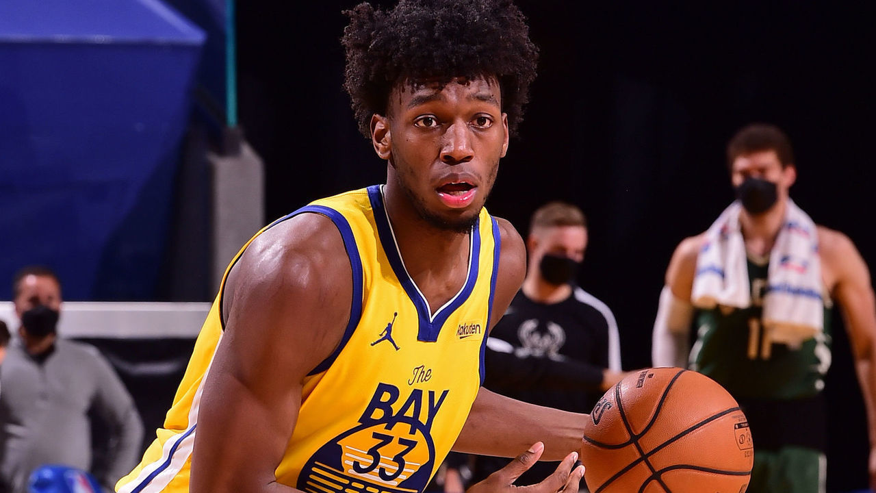 SAN FRANCISCO, CA - APRIL 6: James Wiseman #33 of the Golden State Warriors dribbles the ball against the Milwaukee Bucks on April 6, 2021 at Chase Center in San Francisco, California. NOTE TO USER: User expressly acknowledges and agrees that, by downloading and or using this photograph, user is consenting to the terms and conditions of Getty Images License Agreement. Mandatory Copyright Notice: Copyright 2021 NBAE