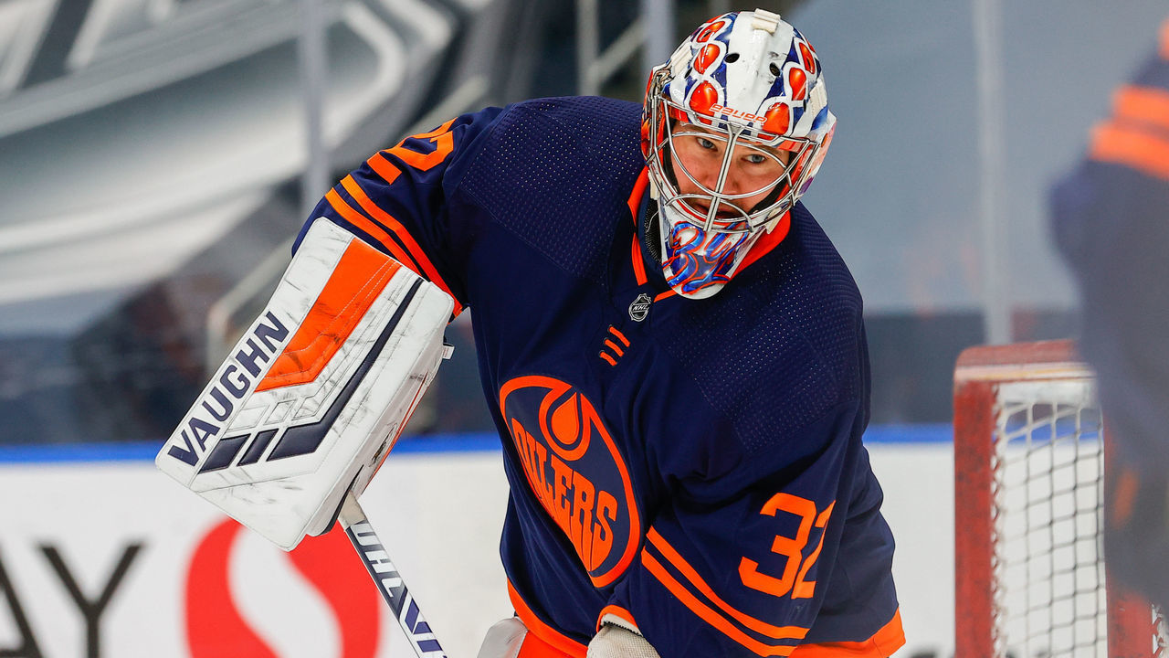 EDMONTON, AB - MAY 15: Edmonton Oilers Goalie Alex Stalock (32) takes warm up for the first time as an Oiler during the Edmonton Oilers game versus the Vancouver Canucks on MAY 15, 2021 at Rogers Place in Edmonton, AB.