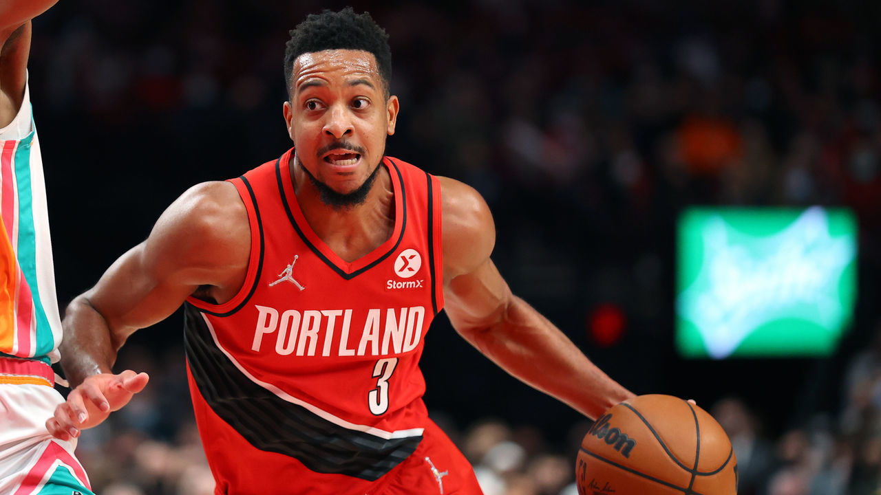 PORTLAND, OREGON - DECEMBER 02: CJ McCollum #3 of the Portland Trail Blazers handles the ball during the first quarter against the San Antonio Spurs at Moda Center on December 02, 2021 in Portland, Oregon.