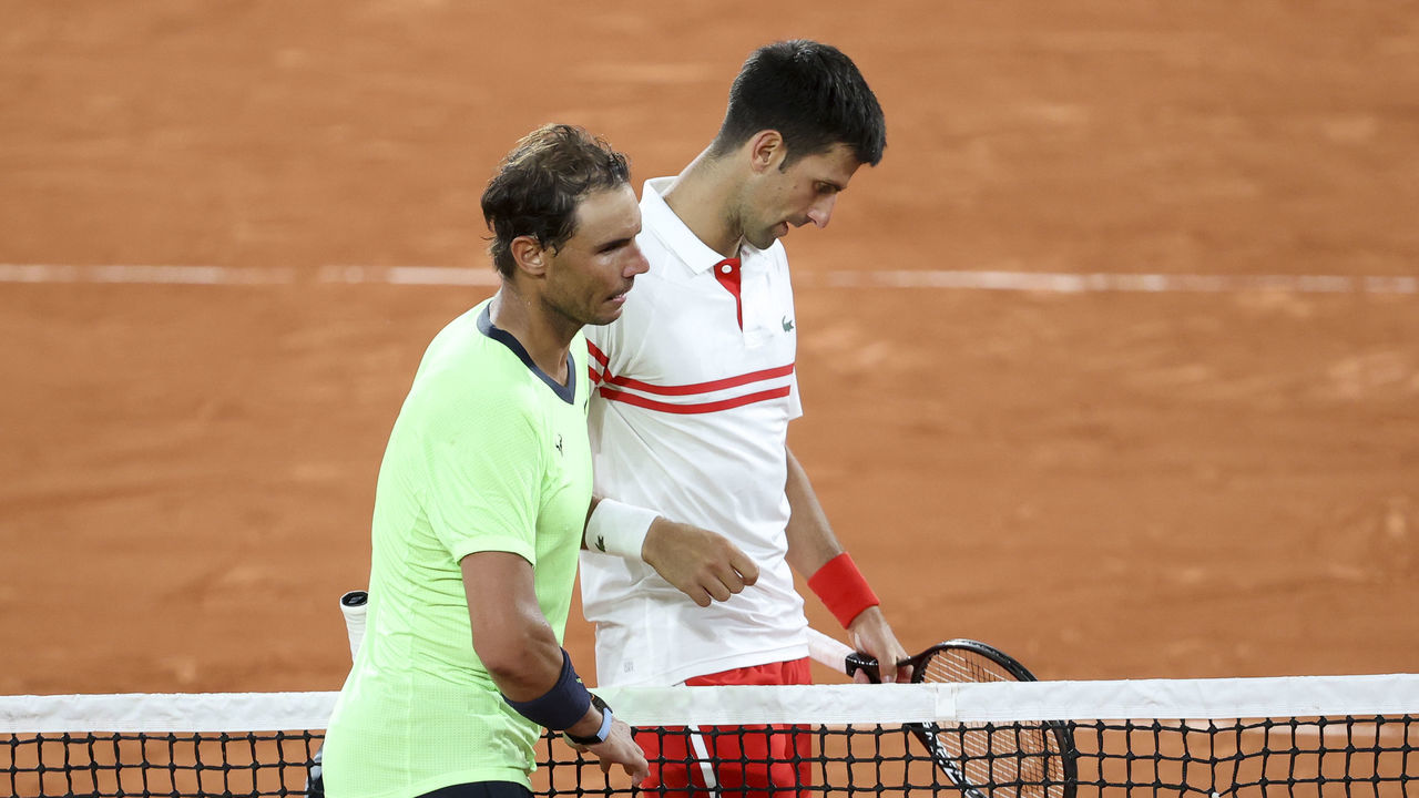 PARIS, FRANCE - JUNE 11: Novak Djokovic of Serbia salutes Rafael Nadal of Spain after his semi-final victory during day 13 of the French Open 2021, Roland-Garros 2021, Grand Slam tennis tournament at Roland Garros stadium on June 11, 2021 in Paris, France.