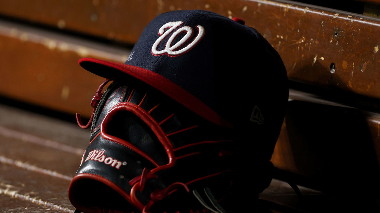 CINCINNATI, OHIO - SEPTEMBER 23: A detail view of a Washington Nationals hat in the dugout during the game against the Cincinnati Reds at Great American Ball Park on September 23, 2021 in Cincinnati, Ohio.