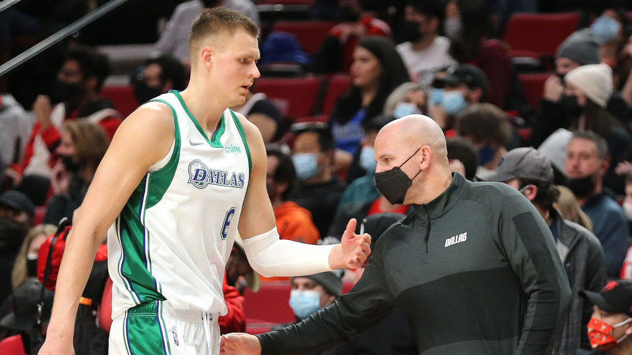 PORTLAND, OREGON - DECEMBER 27: Kristaps Porzingis #6 of the Dallas Mavericks is taken out of the game for the night by head coach Jason Kidd in the fourth quarter against the Portland Trail Blazers Moda Center on December 27, 2021 in Portland, Oregon.