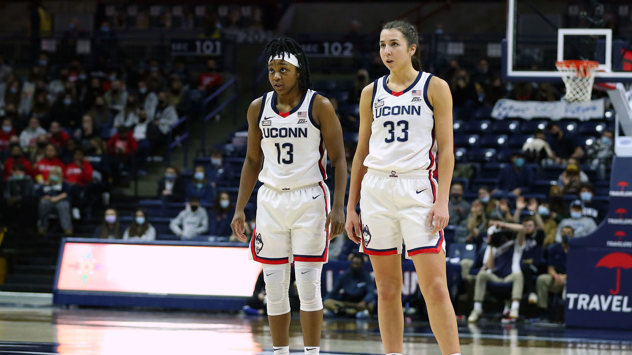 STORRS, CT - JANUARY 09: UConn Huskies guard Christyn Williams (13) and UConn Huskies guard Caroline Ducharme (33) during the college basketball game between Creighton Bluejays and UConn Huskies on January 9, 2022, at Harry A. Gampel Pavilion in Storrs, CT.