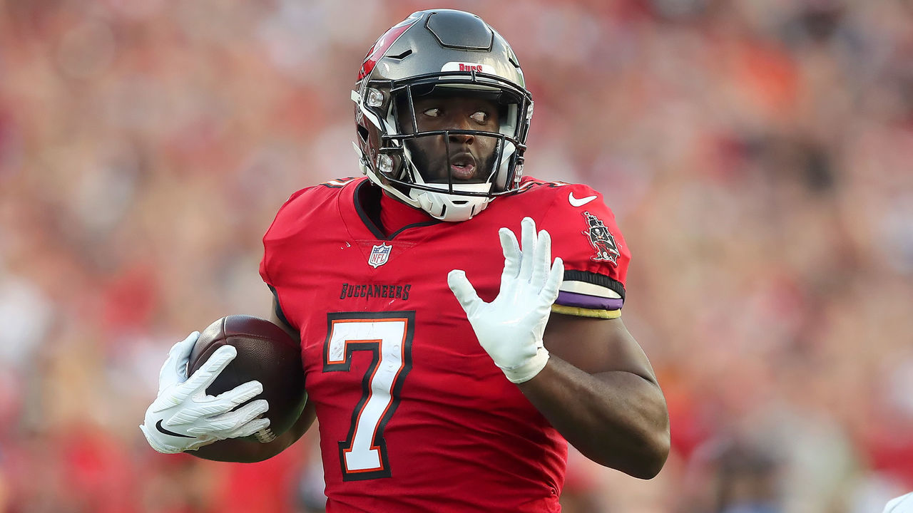TAMPA, FL - DECEMBER 12: Tampa Bay Buccaneers Running Back Leonard Fournette (7) runs the ball to the end zone for a touchdown during the regular season game between the Buffalo Bills and the Tampa Bay Buccaneers on December 12, 2021 at Raymond James Stadium in Tampa, Florida.