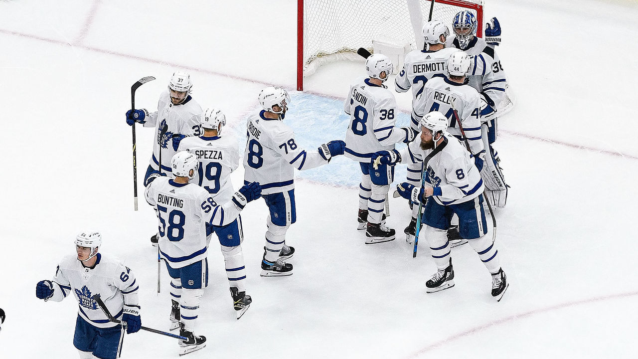 ST. LOUIS, MO - JANUARY 15: Jack Campbell #36 of the Toronto Maple Leafs is congratulated after defeating the St. Louis Blues 6-5 at the Enterprise Center on January 15, 2022 in St. Louis, Missouri.