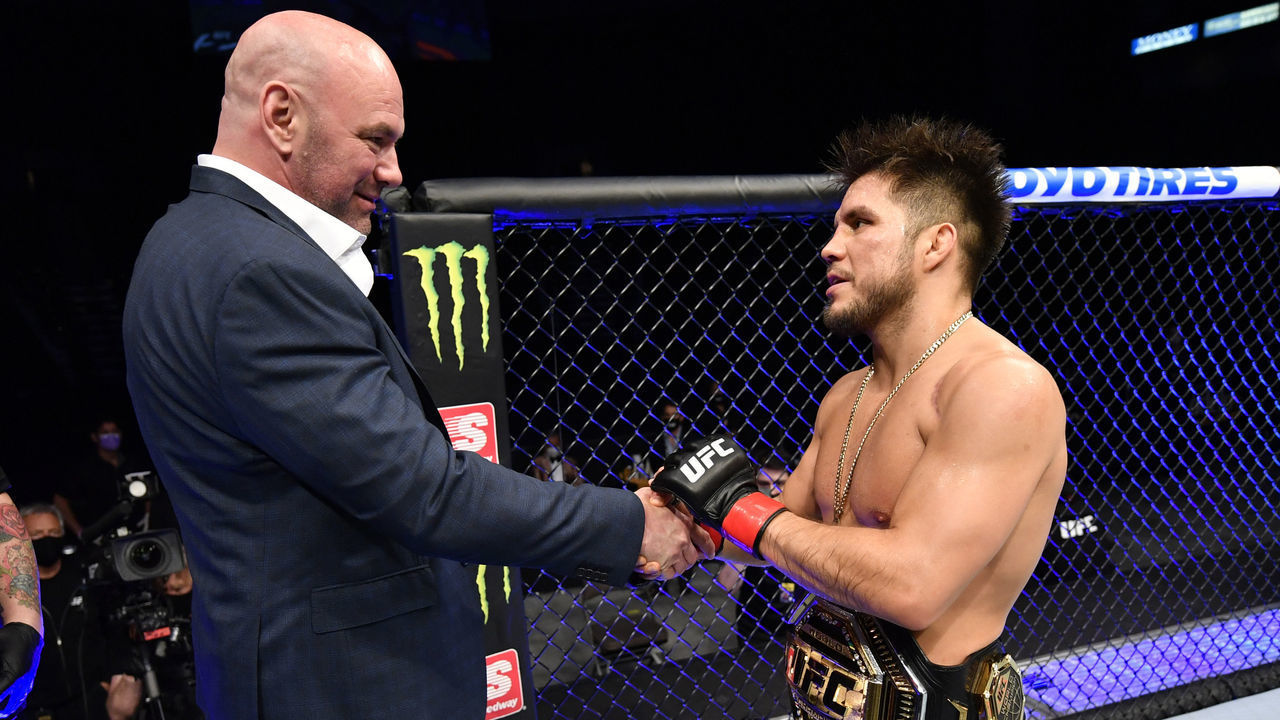 JACKSONVILLE, FLORIDA - MAY 09: Henry Cejudo talks with UFC president Dana White after announcing his retirement in the Octagon after his UFC bantamweight championship fight during the UFC 249 event at VyStar Veterans Memorial Arena on May 09, 2020 in Jacksonville, Florida.
