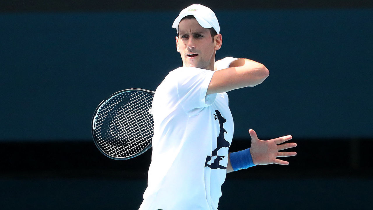 Serbia's Novak Djokovic takes part in a training session in Melbourne ahead of the Australian Open tennis tournament on January 11, 2022, a day after a court overturned the Australian government's decision to cancel his visa on Covid-19 vaccination grounds. - -- IMAGE RESTRICTED TO EDITORIAL USE - STRICTLY NO COMMERCIAL USE --